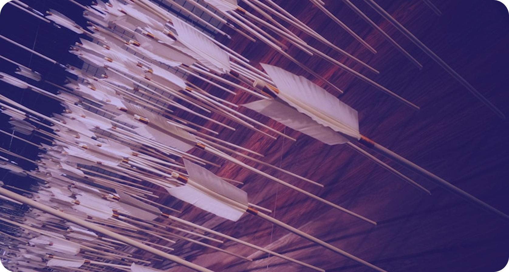 A dense volley of feathered arrows in flight, tinted purple